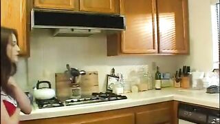 Sexy cheerleader sucking jock in kitchen