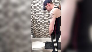 Andrew discharges his load on his Miller hat!