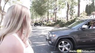 Small golden-haired banged by random ebony man