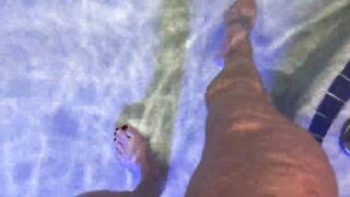 Amazon Kandy Flexes Her Biggest Biceps in Her Hotel Pool