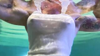 Amazon Kandy Flexes Her Biggest Biceps in Her Hotel Pool