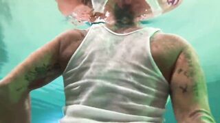 Amazon Kandy Flexes Her Biggest Biceps in Her Hotel Pool