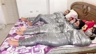 5 Mummified Angels Struggle All Wrapped up and Gagged!