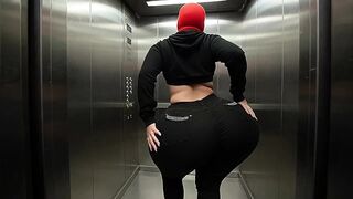 Large Butt Angel in Constricted Ebony Jeans Dancing Softly in Elevator