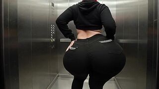 Large Butt Angel in Constricted Ebony Jeans Dancing Softly in Elevator