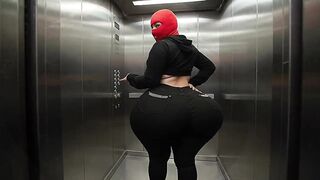 Large Butt Angel in Constricted Ebony Jeans Dancing Softly in Elevator