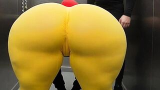 Large Booty Lalin girl in Constricted Yellow Leggings Dancing in the Elevator