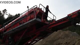 Granny is walking around in a gravel pit wearing sheer leggings!