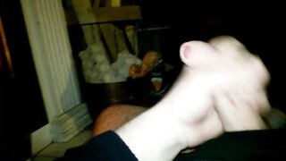 A jack off by the fireplace.