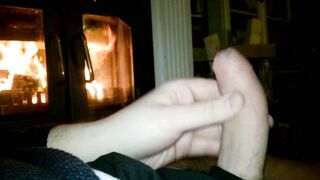 A jack off by the fireplace.