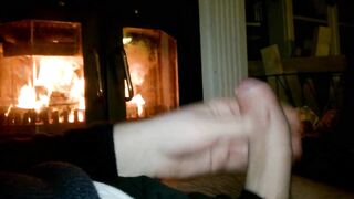 A jack off by the fireplace.
