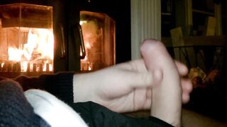 A jack off by the fireplace.