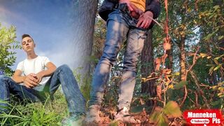 Dude lengthy pissing in the forest beneath a tree