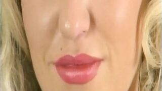 Golden-haired Honey Rides Realistic Vibrator in Purple Bodysuit