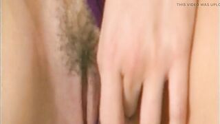 Golden-haired Honey Rides Realistic Vibrator in Purple Bodysuit