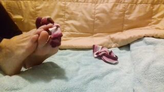 Playing with my feet and soles and taking off my toe socks with my toes