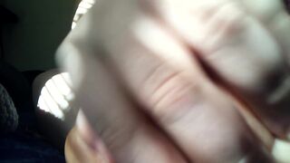 big beautiful woman rubs feet