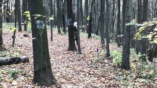 Golden-haired in the Forest Bangs Standing up with a Stranger on Camera