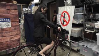 Playing a prank on the bicycle saddle of a marvelous, large-buttocked office