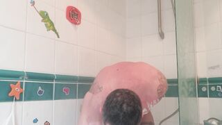 Brawny tattooed chap takes hawt shower after the gym