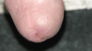gravity pulls the precum out, dripping cum, ejaculation finish