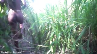 Slender village cutie gathering plants in a jungle