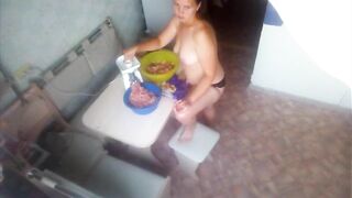 Spying in nature's garb mother in the kitchen turns the meat - MyNakedStepmother