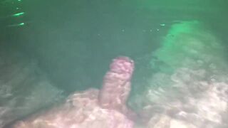 Underwater wank session in backyard in steamy sexy tub glowing at night.
