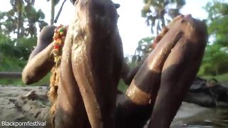Hawt slender Afro village woman bathing and teasing in a river