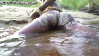 Hawt slender Afro village woman bathing and teasing in a river