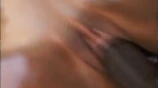 Charming black sweetheart with natural boobs is jumping on biggest ebony ramrod