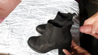 Cumming on her ankle boots