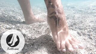 Playfull feet underwater