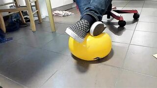 Boy Shoeplay with beach ball in Underneath Armor, Vans Slide Ons, Ebony Socks