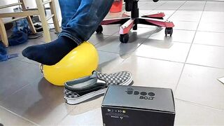 Boy Shoeplay with beach ball in Underneath Armor, Vans Slide Ons, Ebony Socks