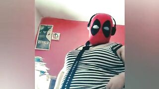 big beautiful woman in DEADPOOL mask STRIPTEASE