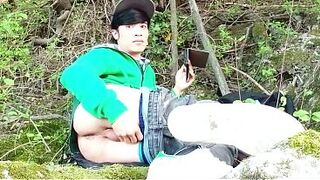 Risky masturbation outdoors a chap's voice caught this cute homo twink with his nuts hanging out, wanking his uncut foreskin, his butt aperture in nature's garb