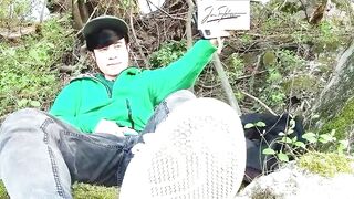 Risky masturbation outdoors a chap's voice caught this cute homo twink with his nuts hanging out, wanking his uncut foreskin, his butt aperture in nature's garb
