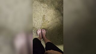 Immodest lengthy feet pee outdoors