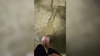 Immodest lengthy feet pee outdoors