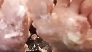 University student steps on cake, food bashing with feet
