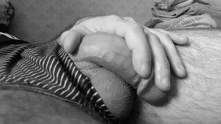 Hunk massages his cock. Large dick with saliva.
