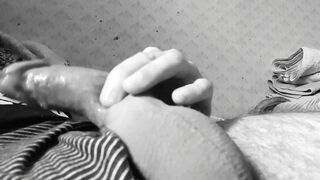 Hunk massages his cock. Large dick with saliva.