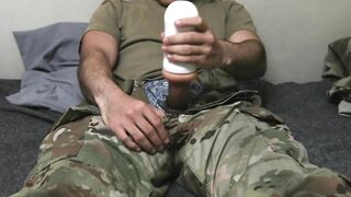 Soldier uses a fleshlight and creampies it