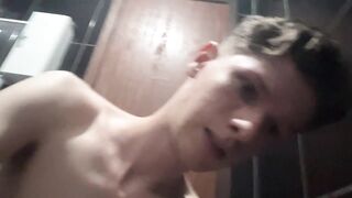 Slender twink pumps ramrod in dim baths light