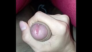 Youthful dude with a large knob stroking in front of the sexy cutie.