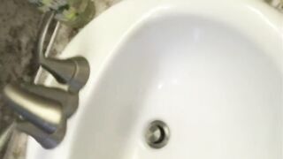 Stroking in the washroom in front of the mirror part two
