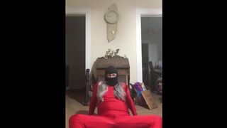 Yoga resistance band wearing red spandex and wig (Raunchy Edition)