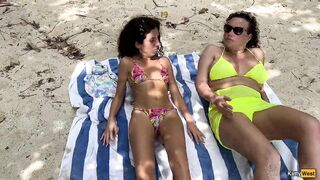 Pervert cummed on beauties during the time that they were sunbathing on a public beach
