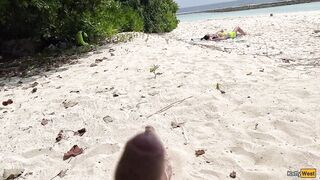 Pervert cummed on beauties during the time that they were sunbathing on a public beach